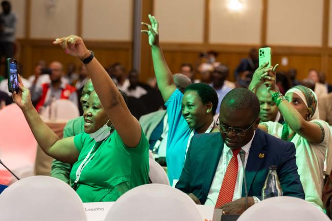 Delegates enjoy the musical performance