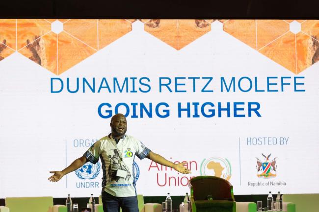 Delegates enjoy a musical performance by Lesotho musian Lesotho musician Dunamis Retz Molefe 