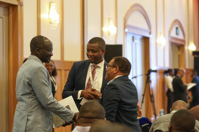 Delegates speak informally