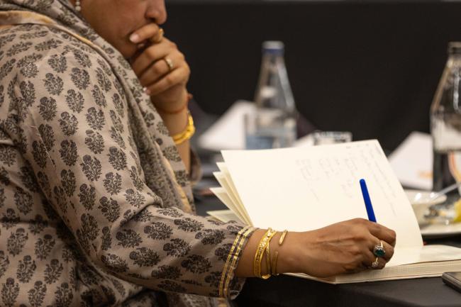 Delegate takes notes