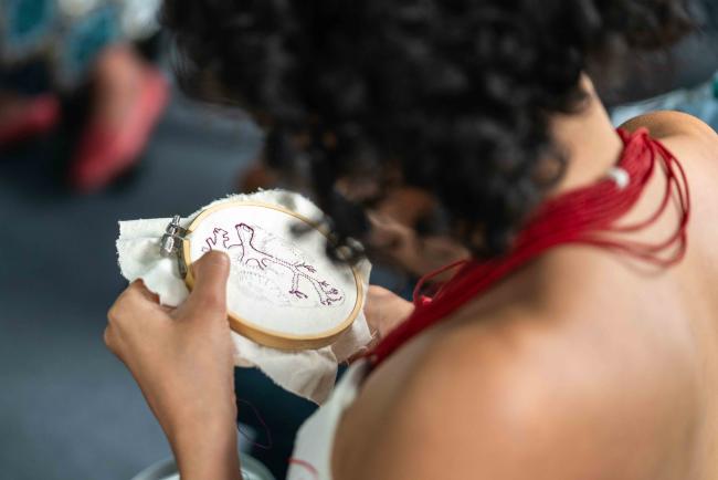 Participant embroidering during the event - gender target 23 -23oct24-photo