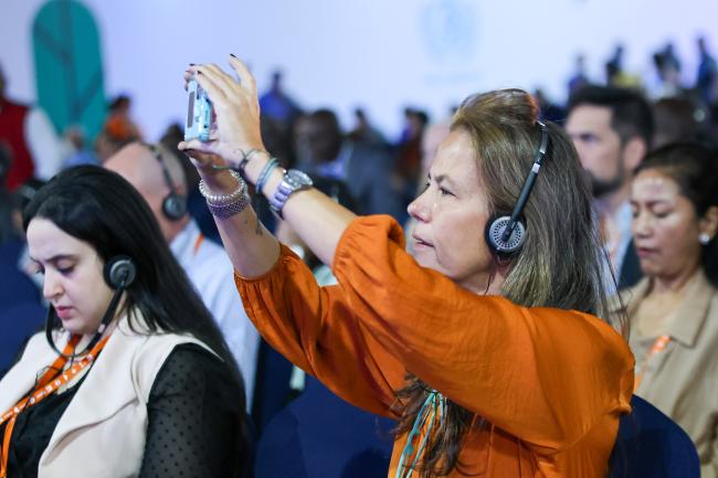 A participant taking pictures 