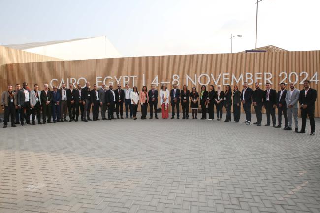 Anacláudia Rossbach, Executive Director, UN-Habitat, with some of the workers of WUF 12 