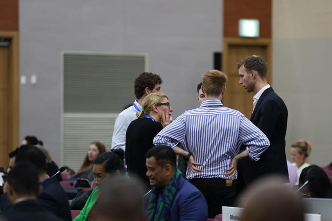 Delegates from the UK consult