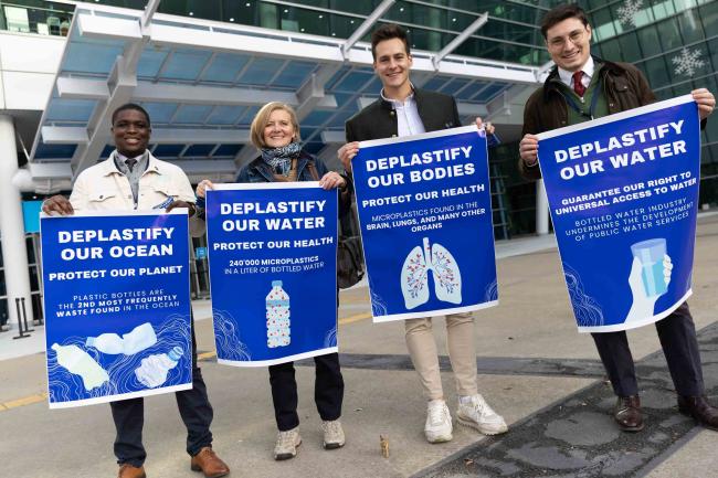 Members of civil society demonstrate outside the venue, drawing attention to the harmful impacts of plastics