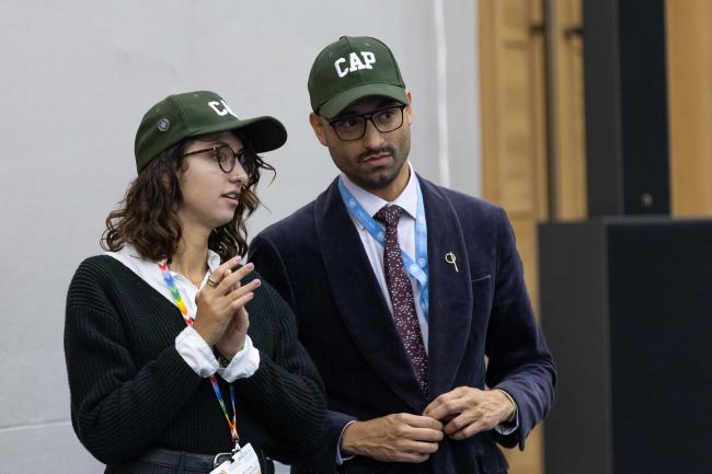 Delegates from the Center for International Environmental Law (CIEL) consult