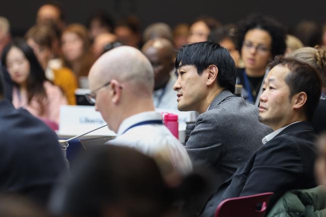 Delegates engage in contact group discussions throughout the day