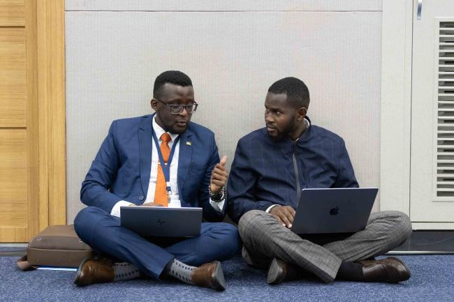 Delegates from Kenya consult 
