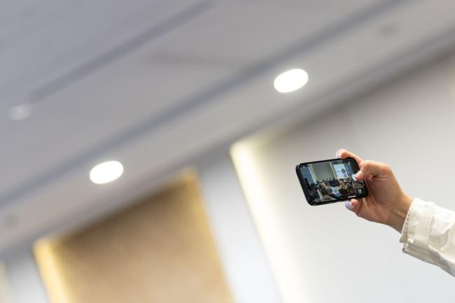 Delegate takes a photo