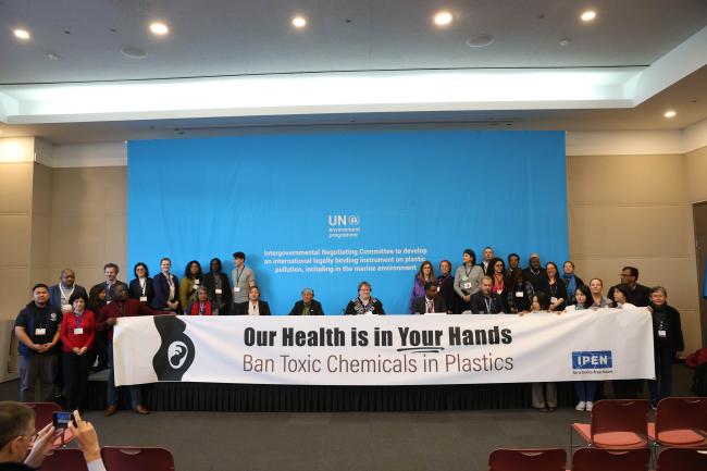 As negotiations continue behind closed doors, members of the International Pollutants Elimination Network (IPEN) hold a press conference to highlight 'what is at stake' in the negotiations