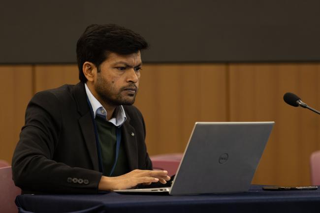 Delegates consider the text