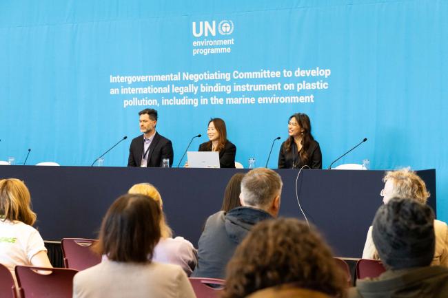 Representatives from Greenpeace hold a press conference to share thoughts on the state of negotiations