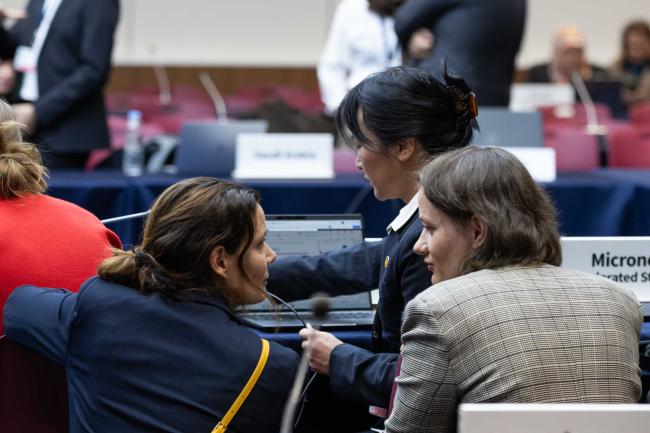 Delegates consult