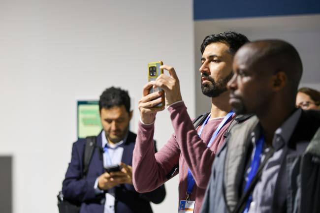 A participant taking pictures 