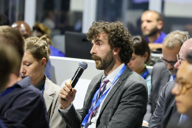 Participants asking questions from the floor