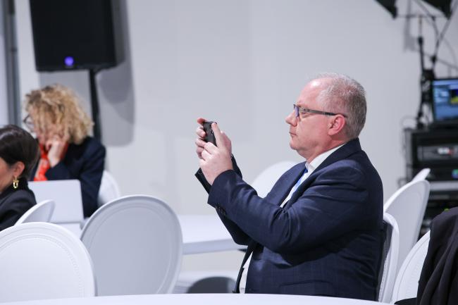 A participant taking a picture