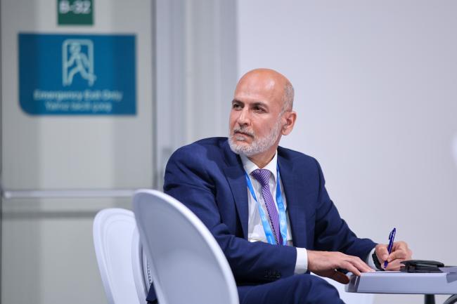 Hossein Fadaei, Head, EMG Secretariat, taking notes 