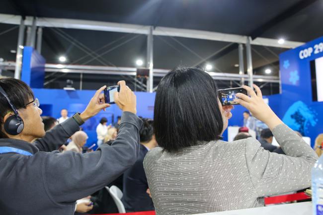 Participants taking pictures
