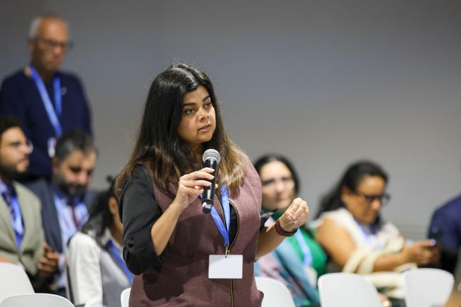 A participant posing a question