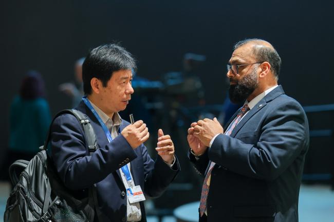 Yingxian Xia, China, with Yaqoub Almatouq, Kuwait