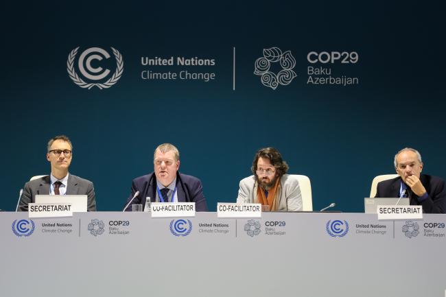 View of the dais during an informal consultation on the technical review of greenhouse gas inventories and other information reported by Parties included in Annex I