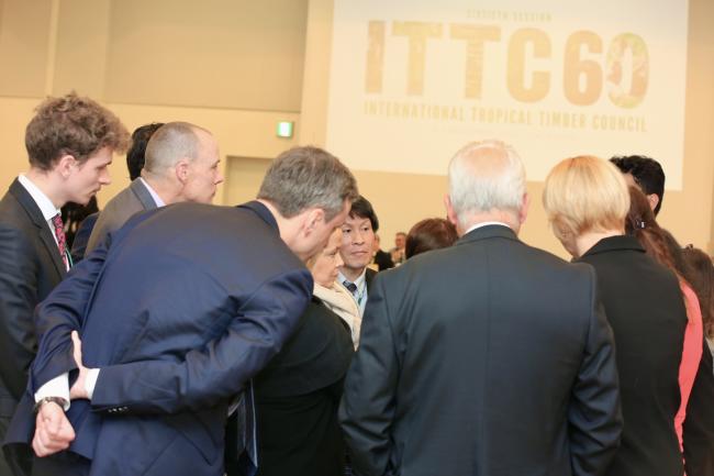Delegates gather for discussions.