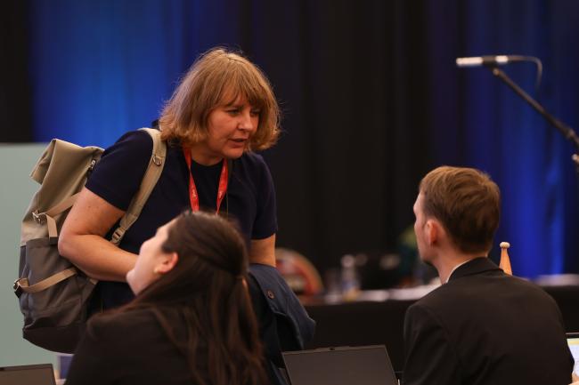 Delegates speak informally