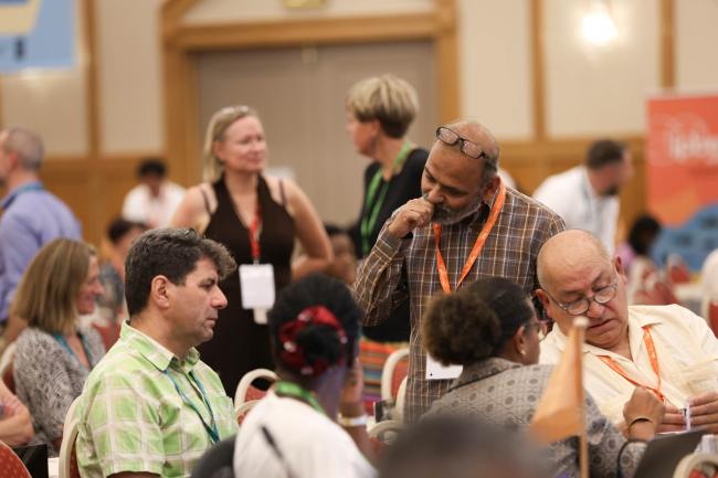 Delegates speak informally