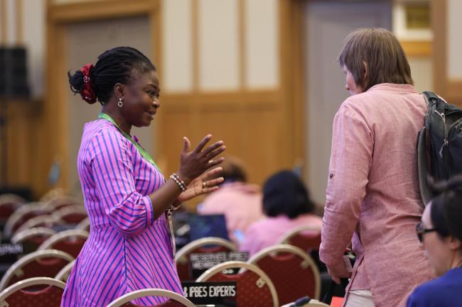 Delegates speak informally