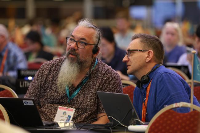 Delegates from Finland consult