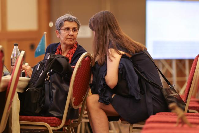 Delegates consult