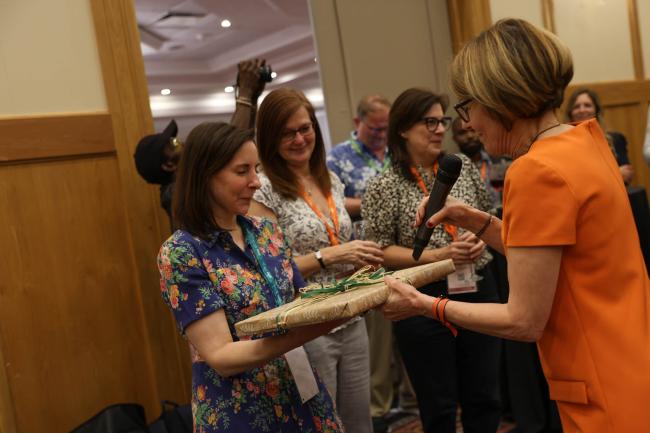 Anne Larigauderie, IPBES Executive Secretary, presents gifts