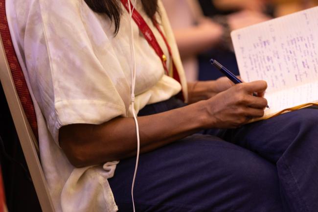 Delegate takes notes