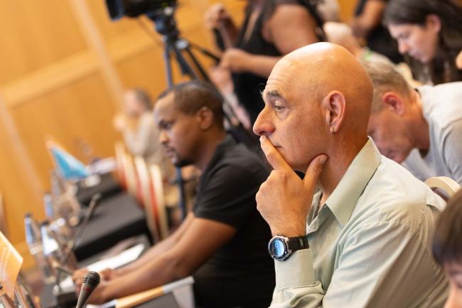 Participants listen to the discussions