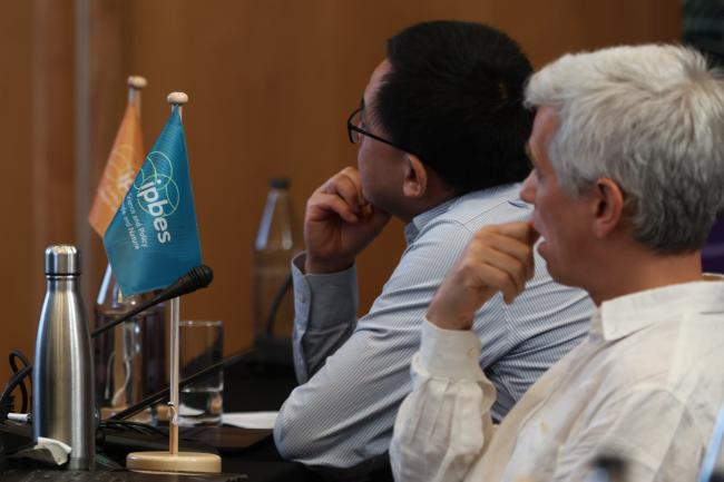 Participants listen to the discussions