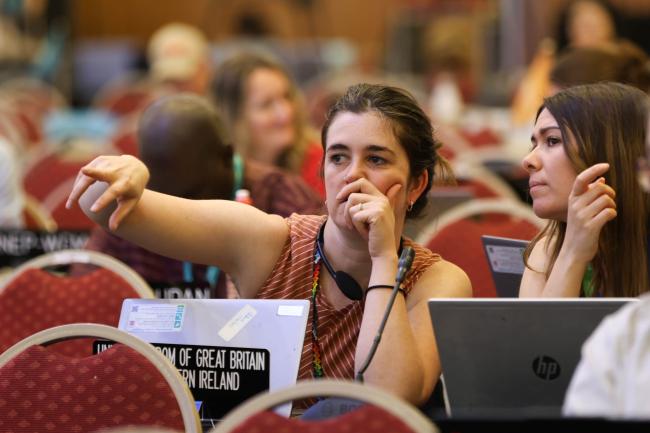 Delegates consult