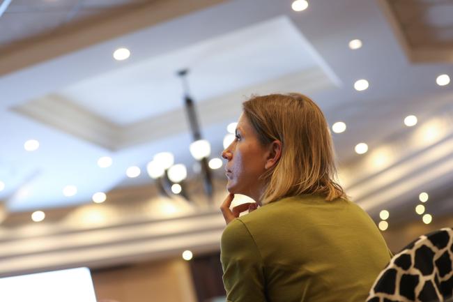 Delegates consider the text