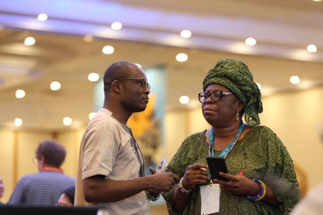 Daniel Mukubi Kikuni, DRC, speaks with Pauline Lambou Ngouanfouo, Cameroon