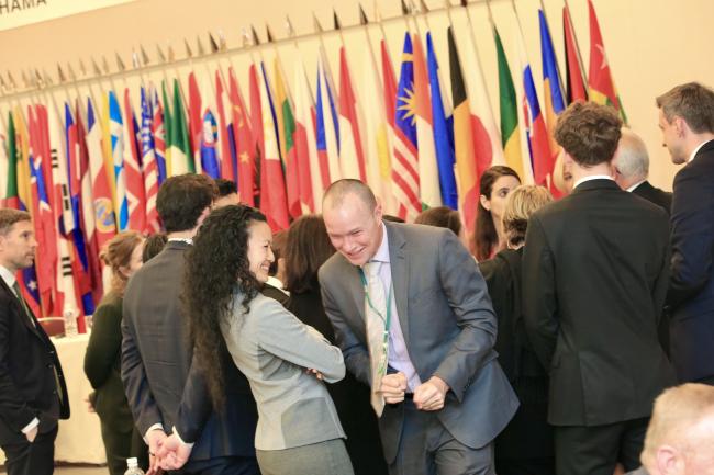 Delegates chatting 