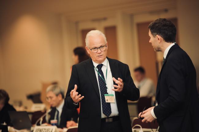 delegates discussing