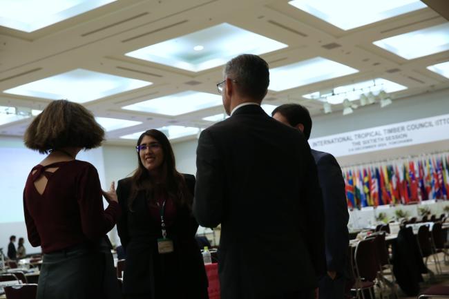 Delegates networking at ITCC-60.