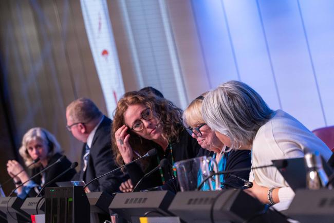 Discussions on the dais - CITES_SC78_5feb2025-photo