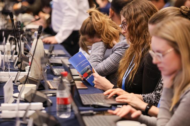 Delegate reads IPCC-62 handbook 