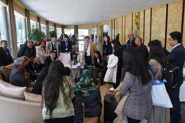 Delegates huddle in the corridors 