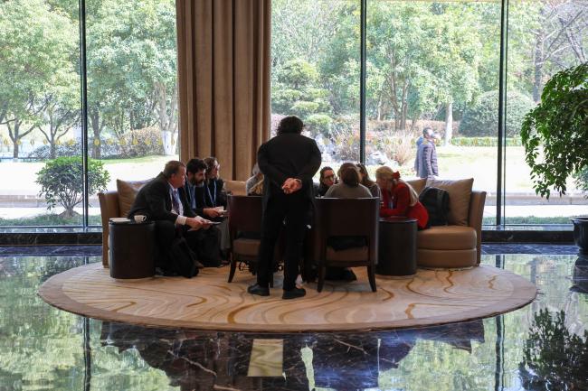Delegates huddle in the corridors 