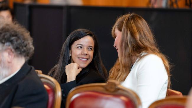 IISD ENB - Monaco 16 - participants speaking in between sessions