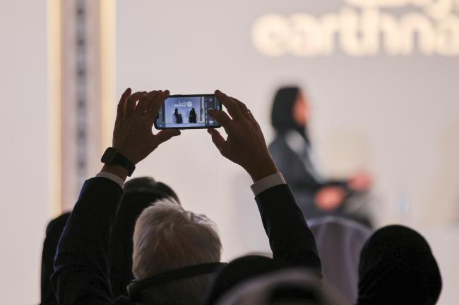 A participant takes a picture