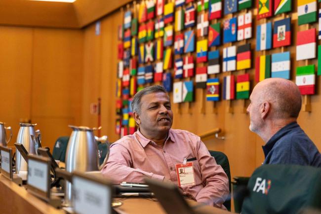 Working Group Co-Chairs Sunil Archak and Michael Ryan - papers 1 - ITPGRFA_OEWG13_4april2025-photo
