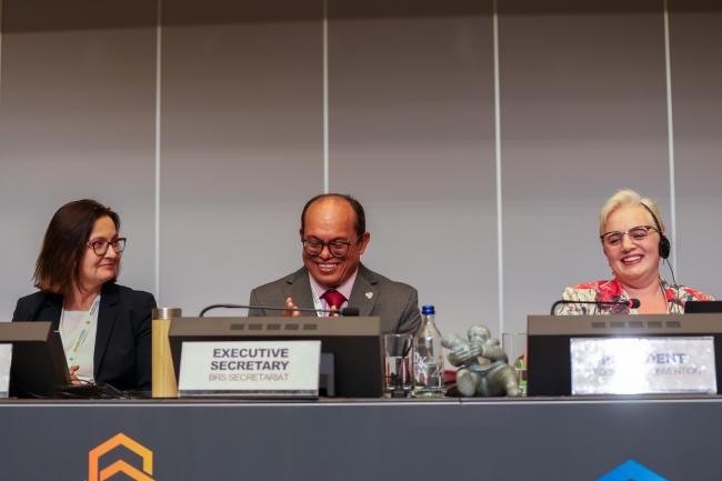 From L-R: Basel Convention COP17 President Anita Sowińska; Rolph Payet, Executive Secretary, BRS Conventions; and Stockholm Convention COP12 President Maya Berci