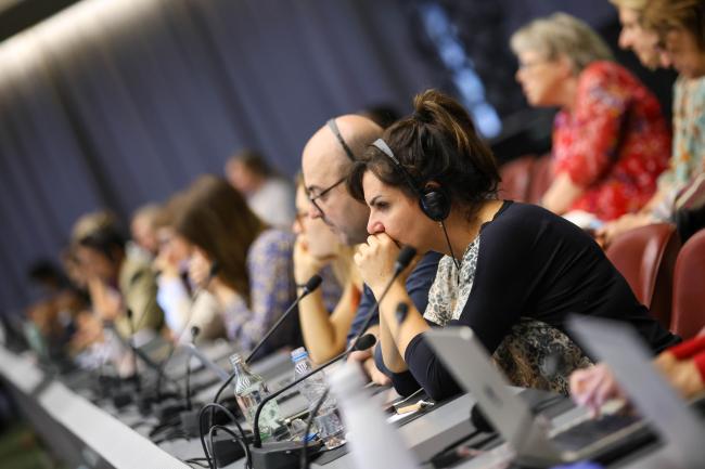 Participants listening to the discussions